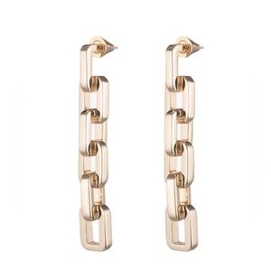 Eddie Borgo Supra link drop gold statement earrings.